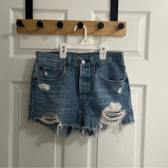 Levi's Pants - Levi’s women’s 501 distressed medium blue cutoff ripped jean shorts